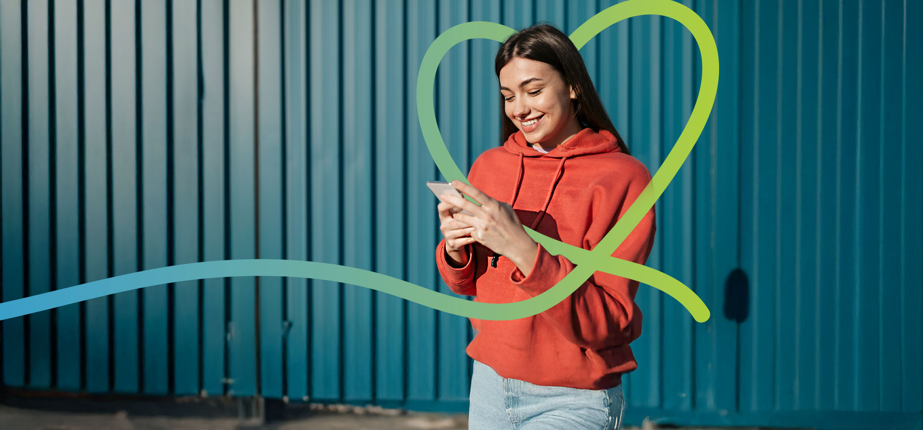 Smiling woman looking at phone